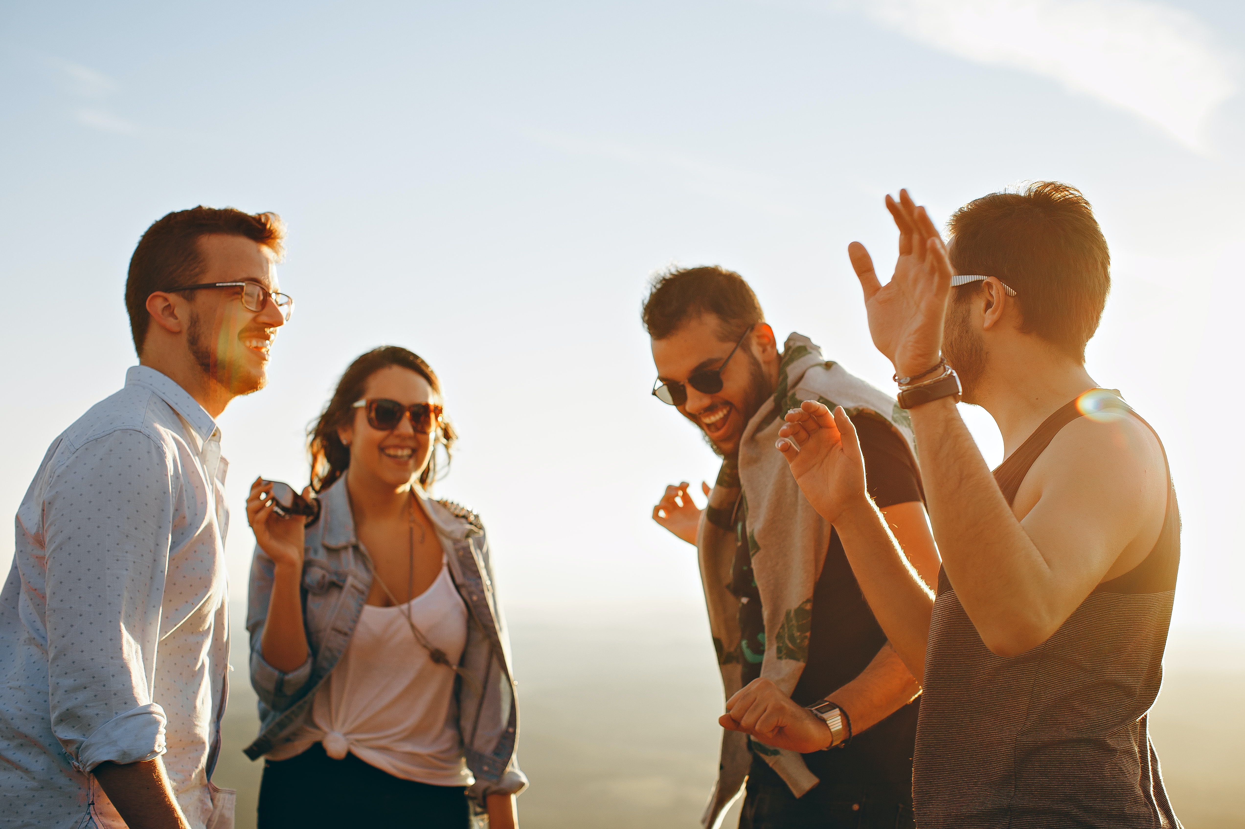 Photo of people smiling in the sun